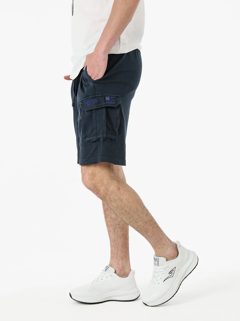 Bermuda da uomo in cotone con tasconi laterali e coulisse - blu