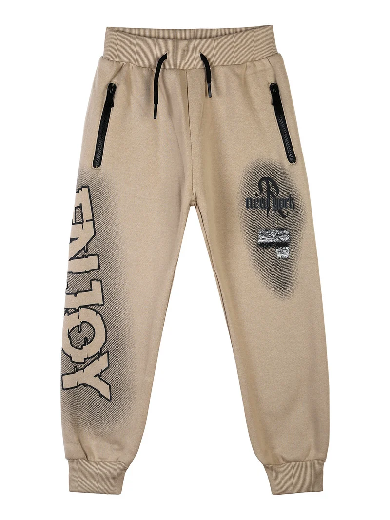 Pantaloni tuta da bambino con polsini e interno caldo - khaki