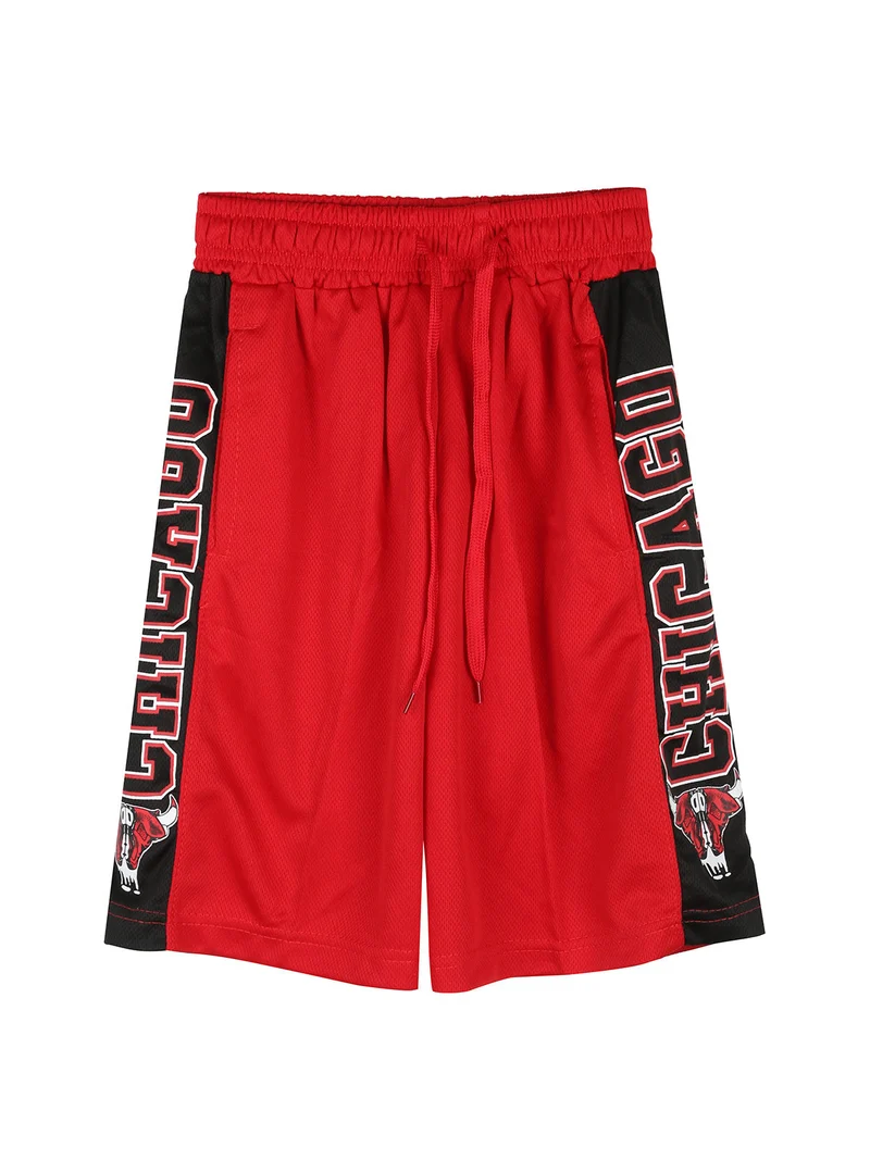Completo da bambino sportivo con t-shirt con bottoni e bermuda - rosso