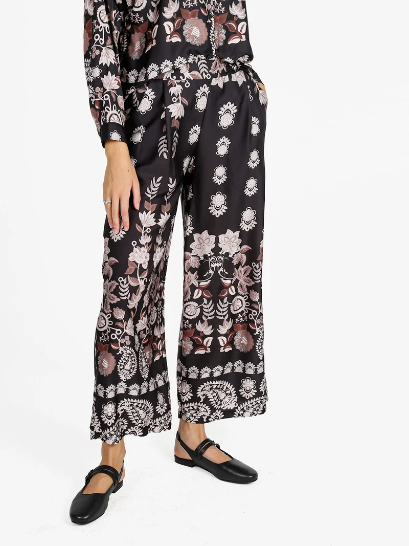 Pantaloni donna effetto raso con stampe - nero