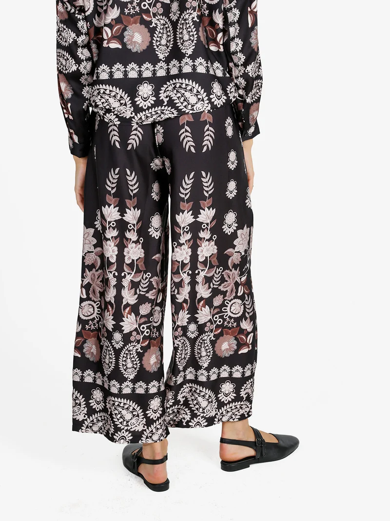 Pantaloni donna effetto raso con stampe - nero