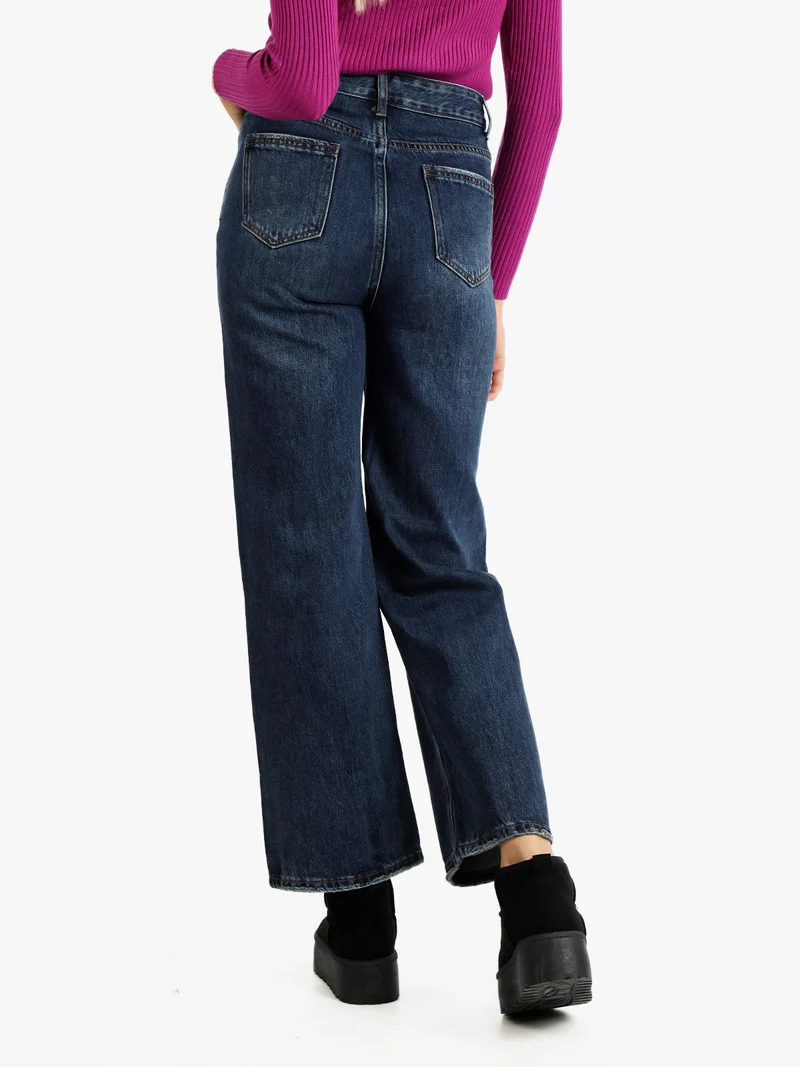 Jeans donna a gamba larga con strappi - jeans