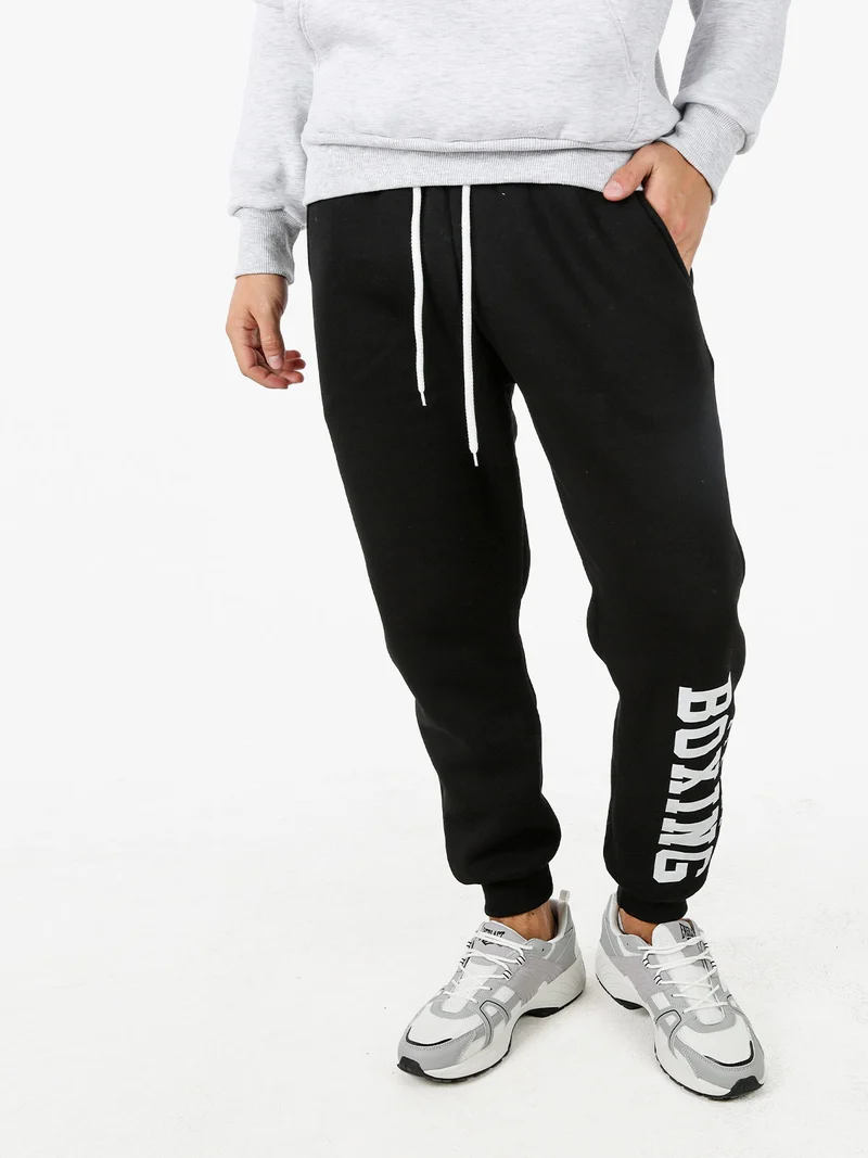 Pantaloni tuta da uomo felpati con logo - nero