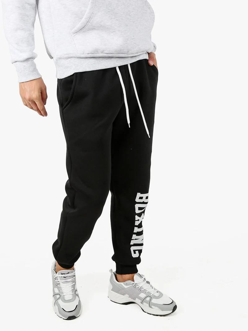 Pantaloni tuta da uomo felpati con logo - nero