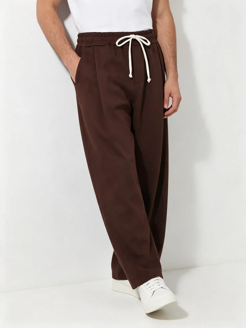 Pantaloni da uomo oversize a gamba larga con coulisse - moro