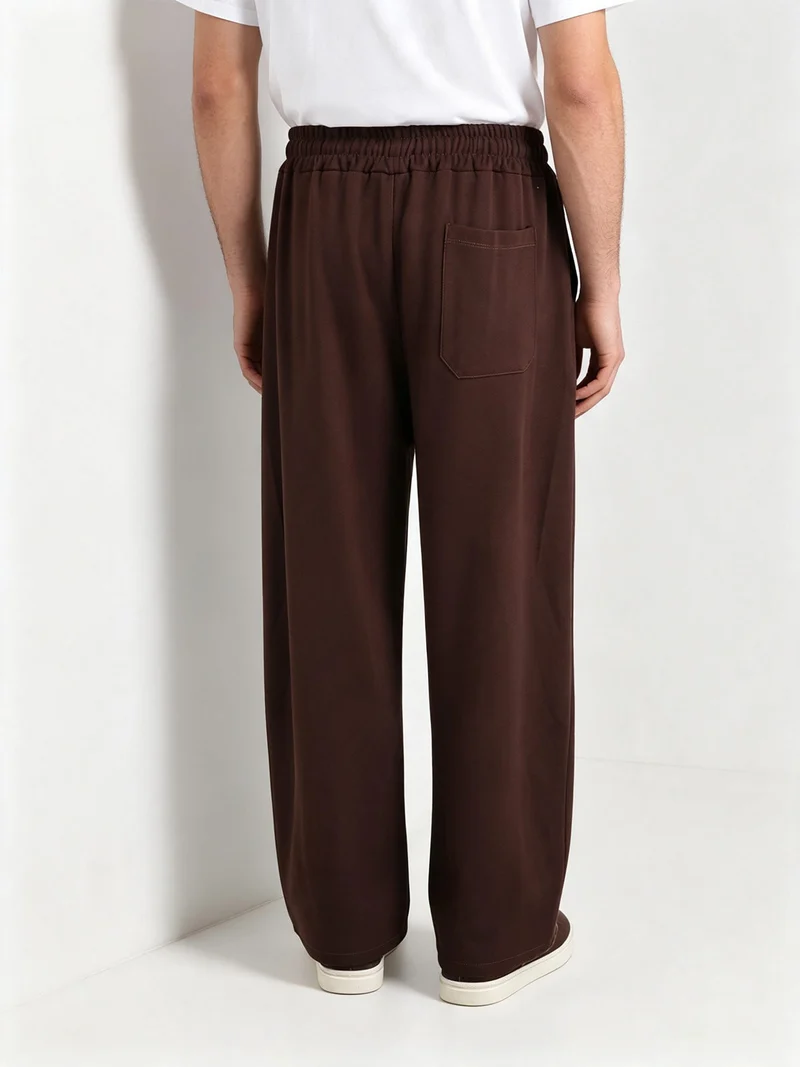 Pantaloni da uomo oversize a gamba larga con coulisse - moro