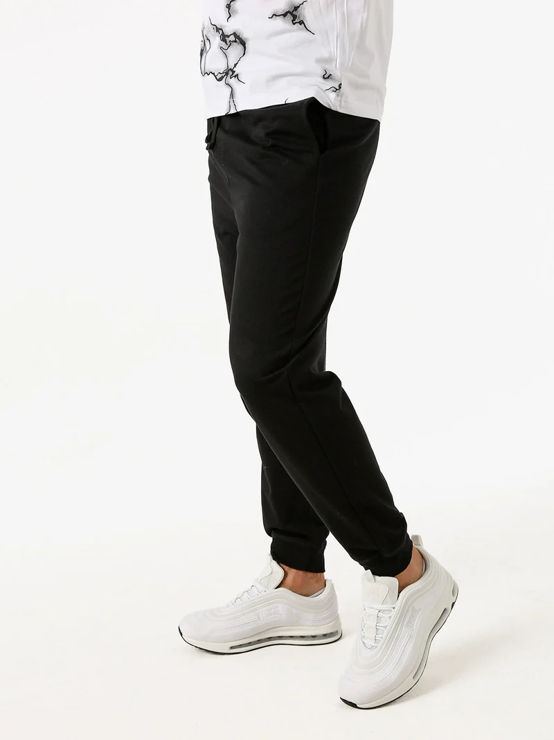Pantaloni tuta da uomo con coulisse e polsini - nero