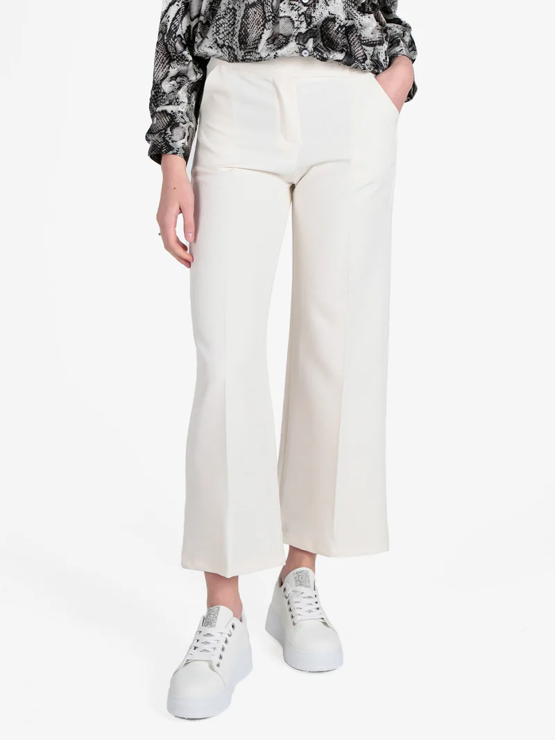 Pantaloni classici da donna a palazzo - panna