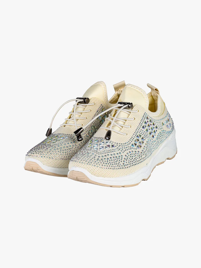 Sneakers donna slip on con borchie - beige