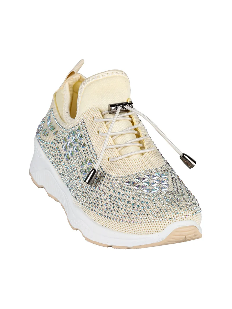 Sneakers donna slip on con borchie - beige