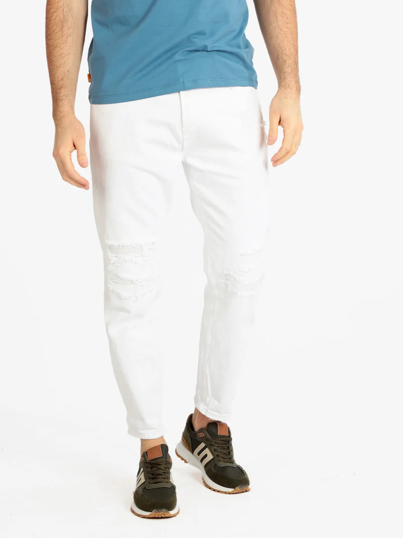 Pantaloni cropped uomo con strappi - bianco