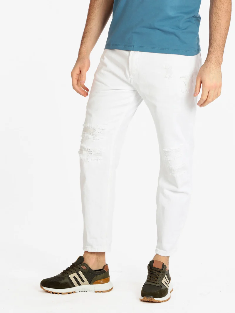 Pantaloni cropped uomo con strappi - bianco