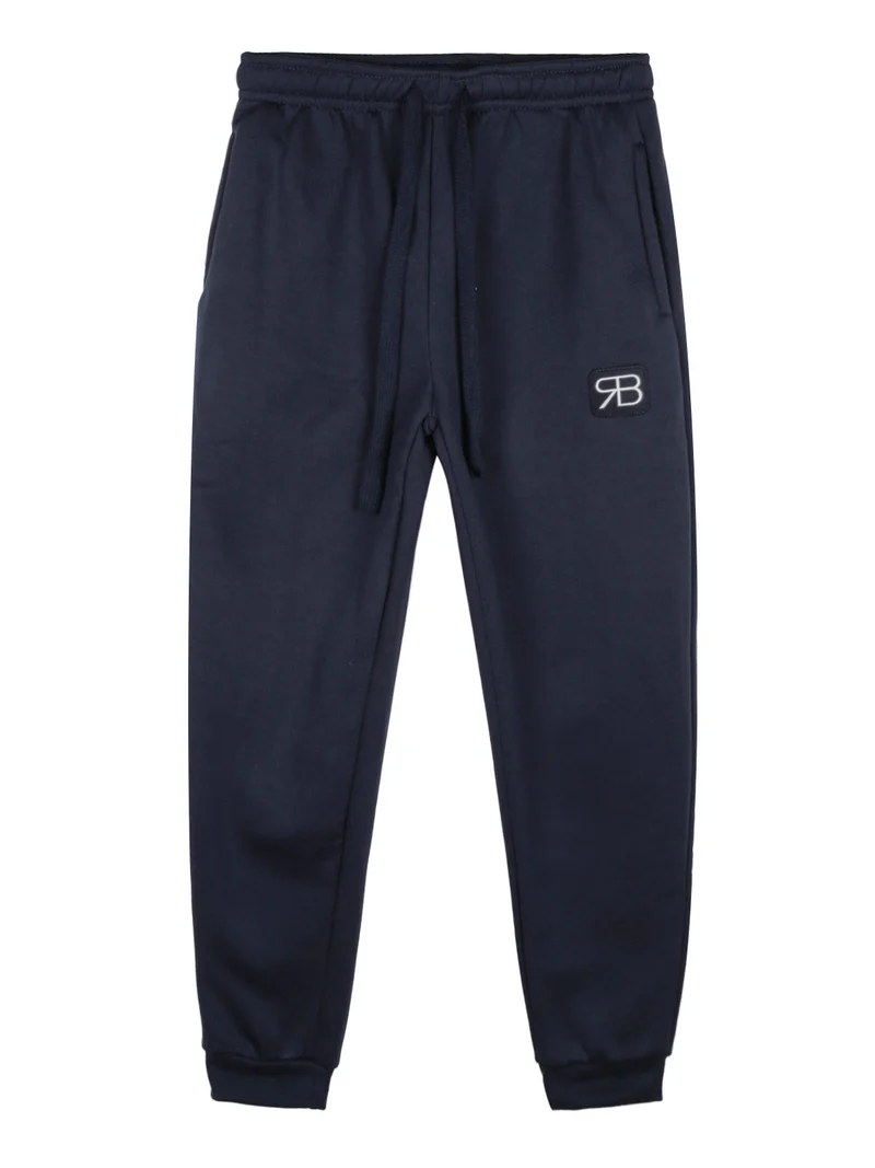 Pantaloni tuta da bambino felpati - blu scuro