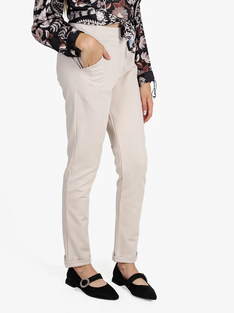 Pantaloni donna a vita bassa con risvolto - beige