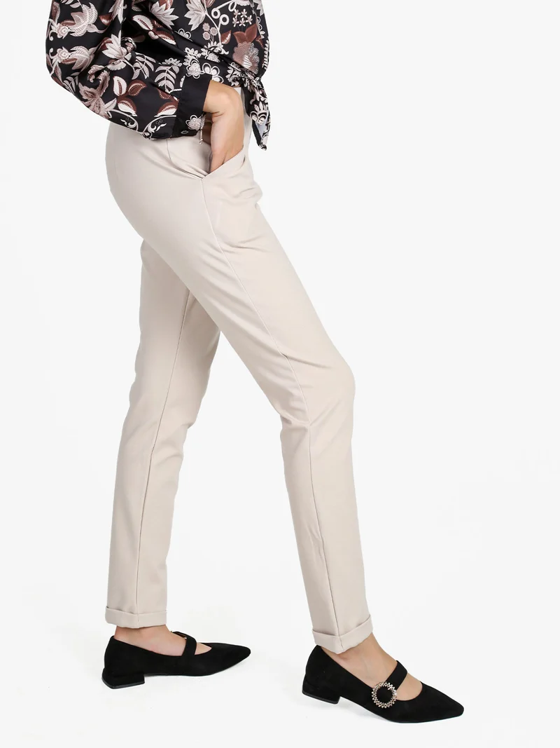 Pantaloni donna a vita bassa con risvolto - beige
