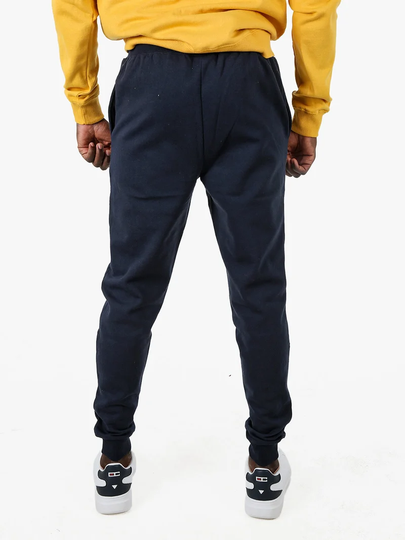 Pantaloni tuta da uomo con coulisse e polsini - blu scuro