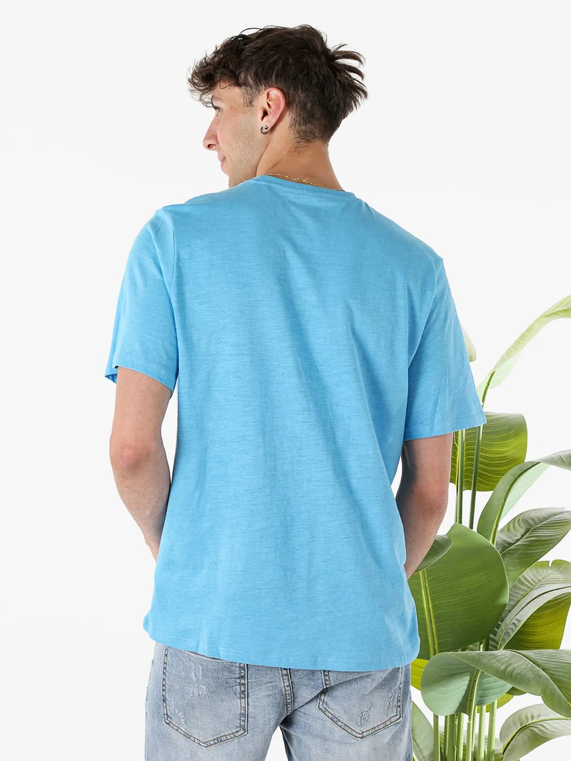 T-shirt in cotone da uomo con taschino - turchese