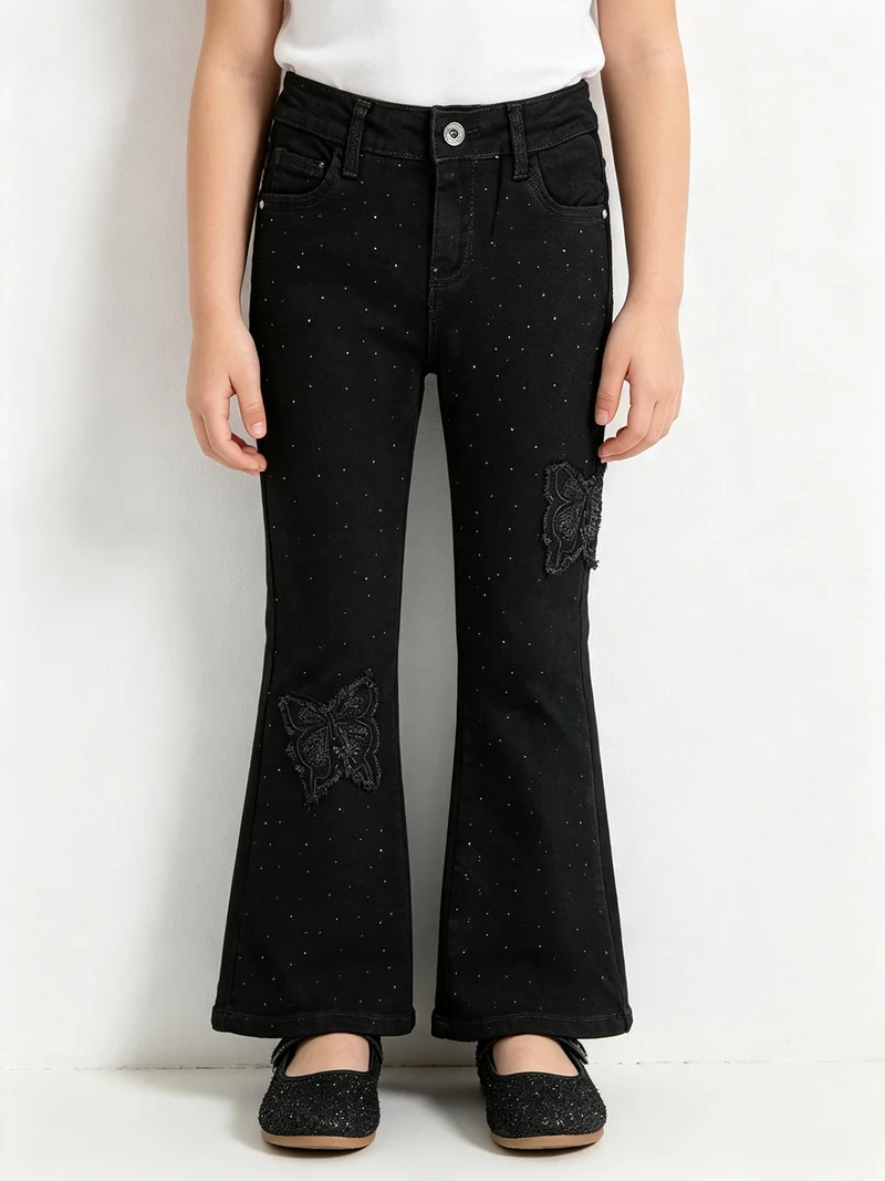 Jeans a zampa da bambina con strass - nero