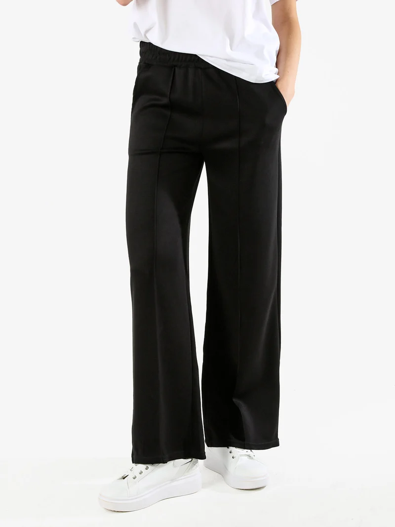 Pantaloni donna a palazzo in felpa con cucitura in rilievo - nero