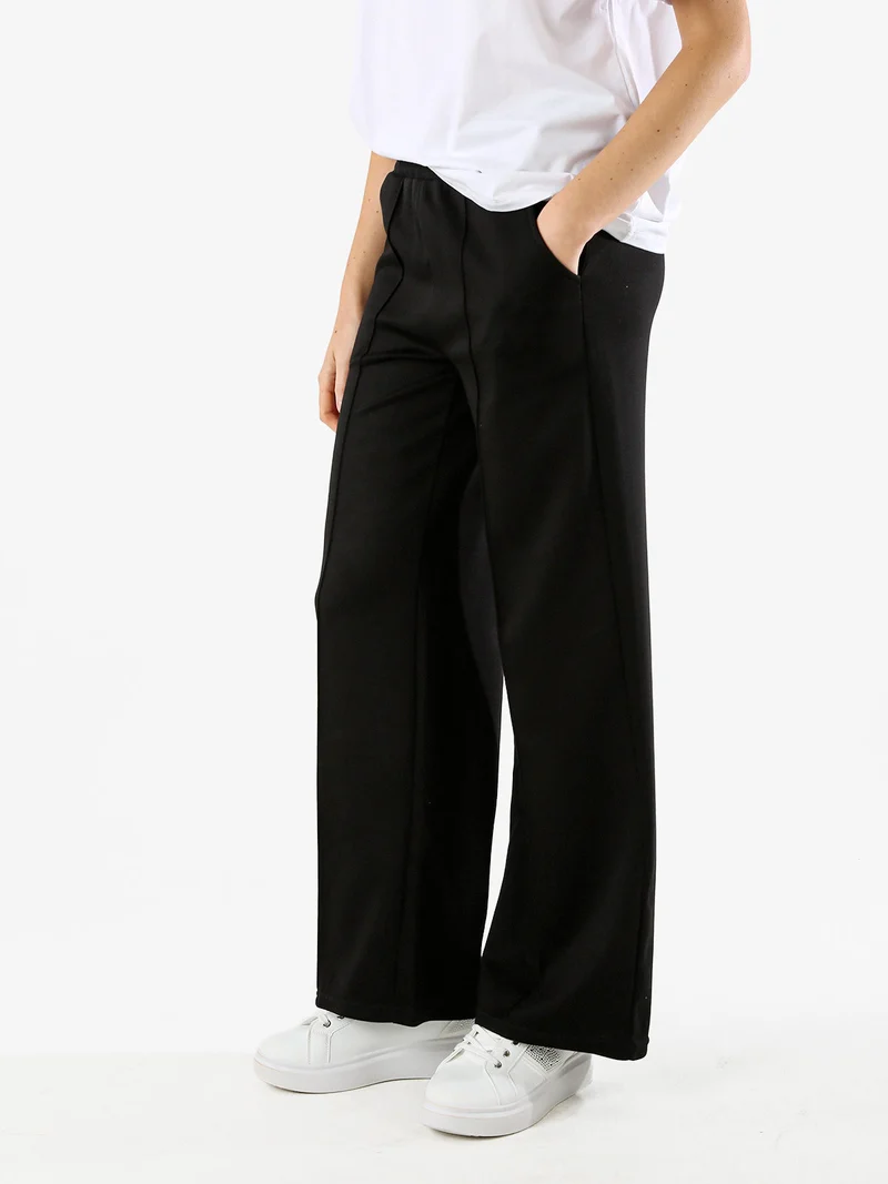 Pantaloni donna a palazzo in felpa con cucitura in rilievo - nero
