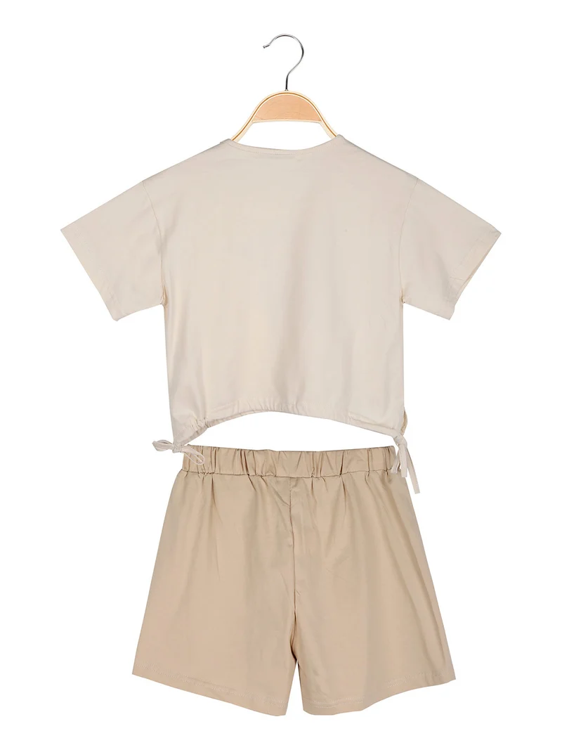 Completo da ragazza 2 pezzi con t-shirt crop e shorts con strass - beige