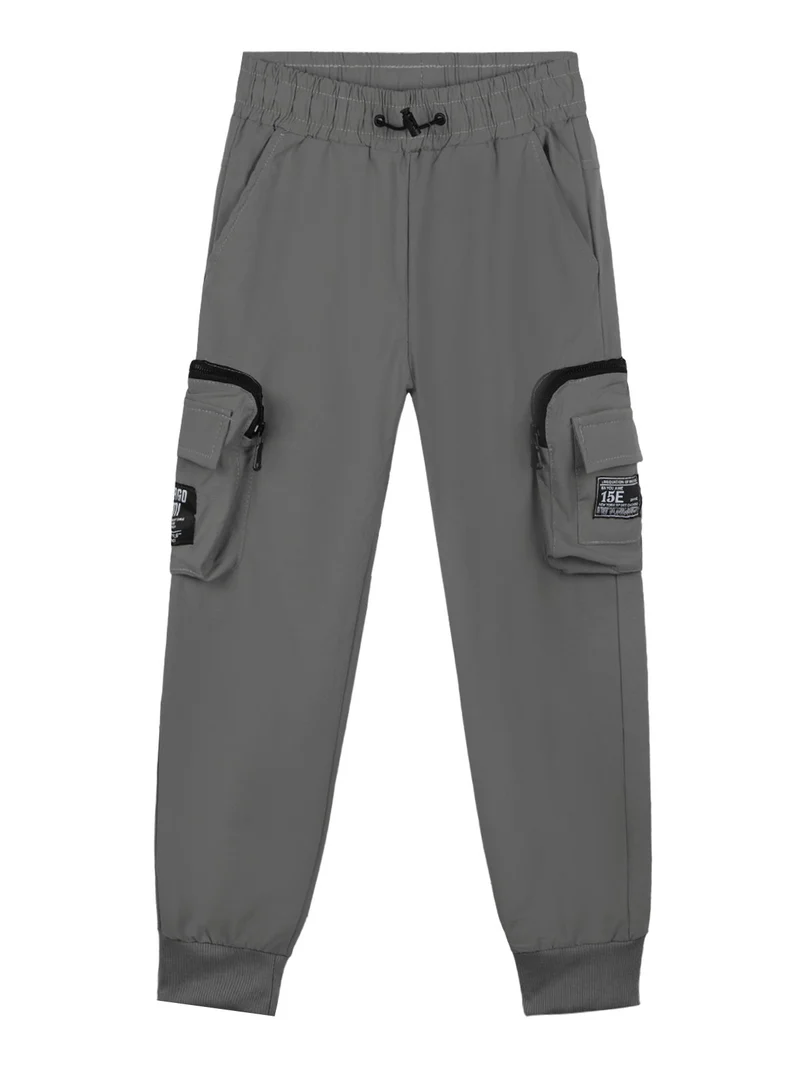 Pantaloni da bambino con tasconi e polsini alle caviglie - grigio