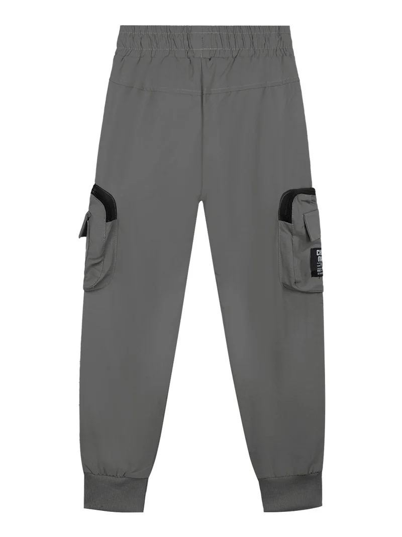 Pantaloni da bambino con tasconi e polsini alle caviglie - grigio
