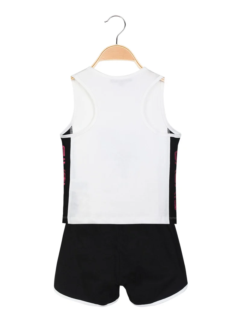 Completo corto sportivo 2 pezzi da bambina con glitter - bianco