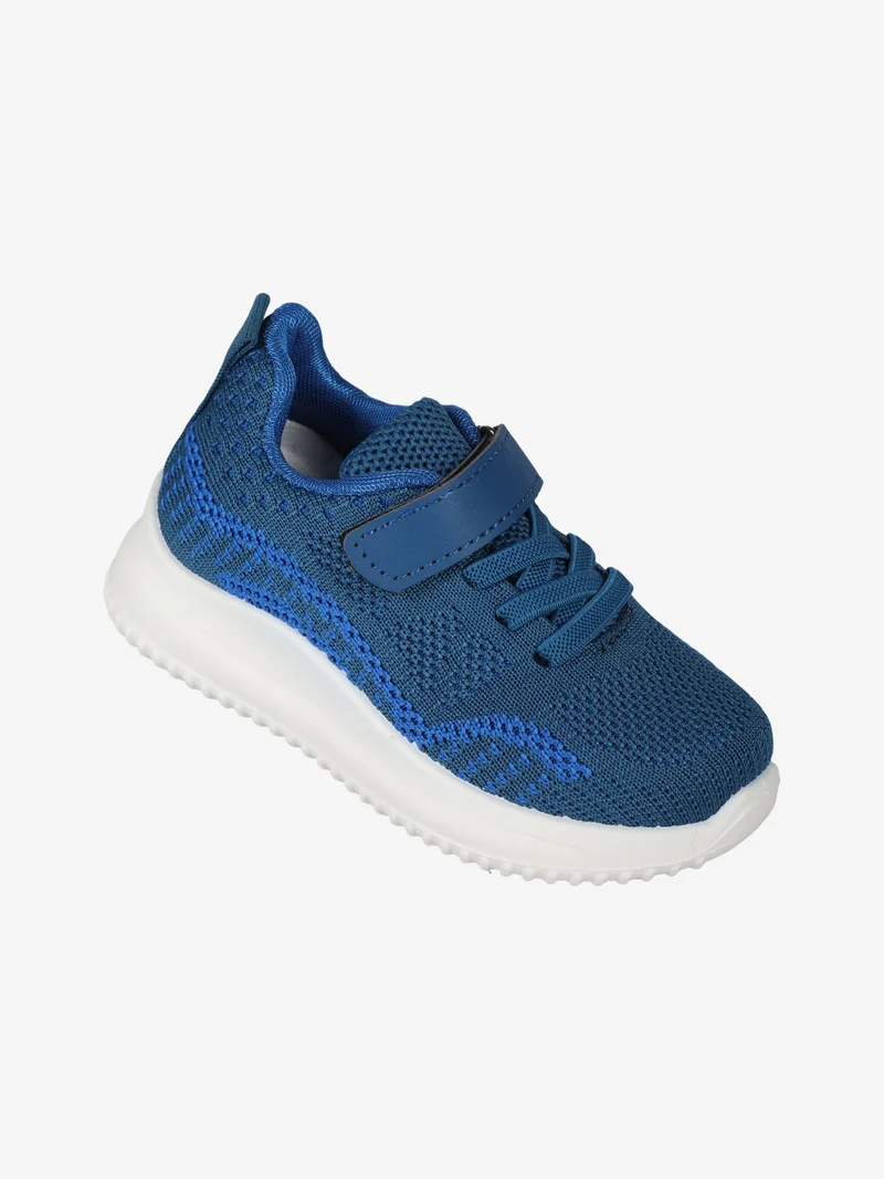 Sneakers da bambino con strappo - jeans