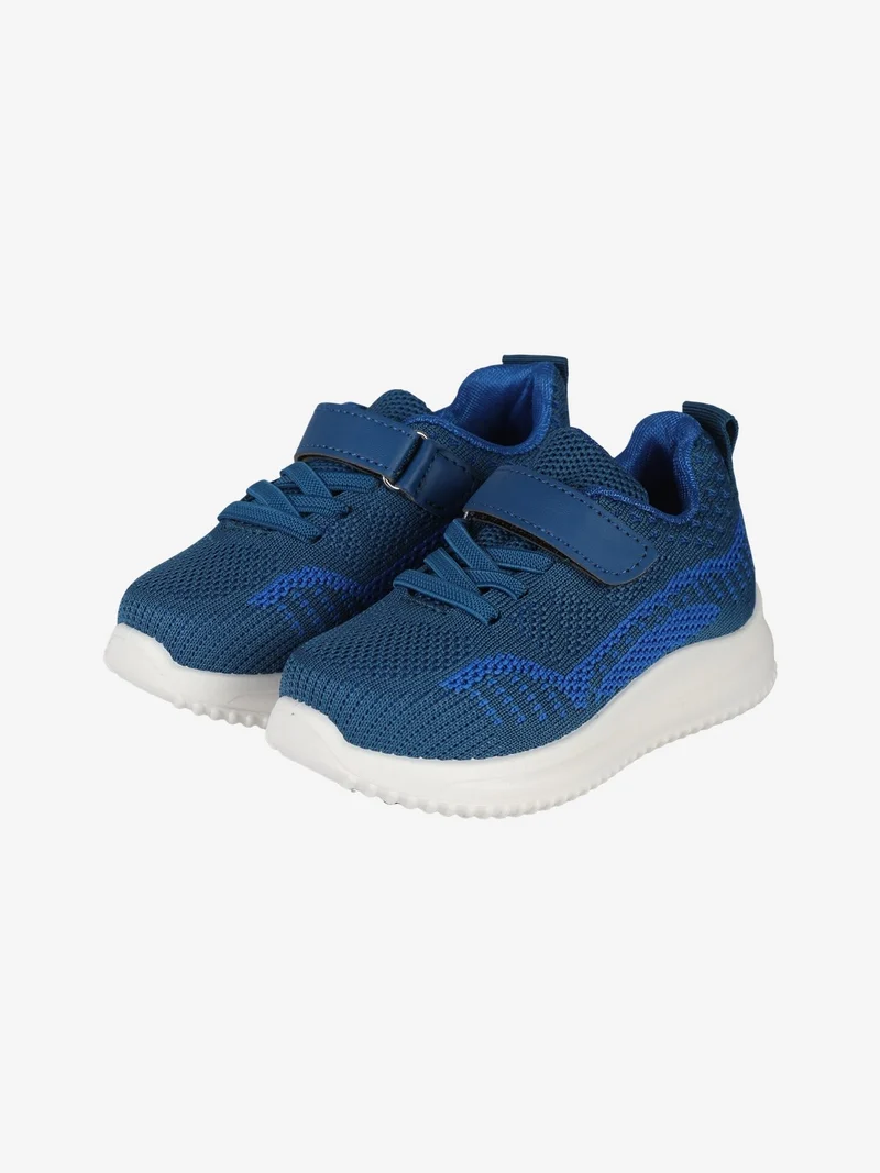 Sneakers da bambino con strappo - jeans