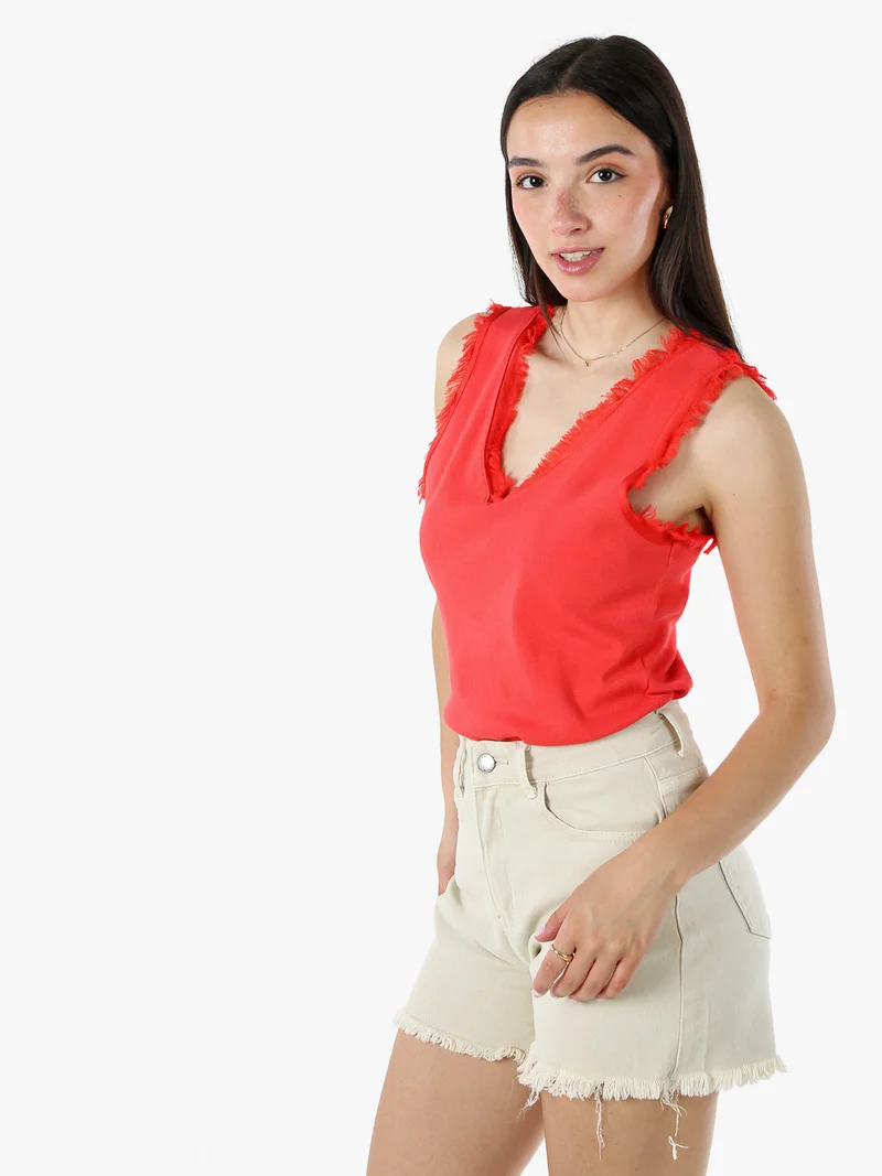 Top donna a costine con scollo a V e bordi sfrangiati - rosso