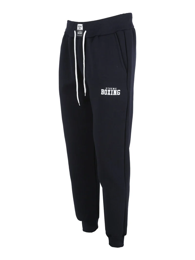 Pantaloni tuta da uomo felpati con polsini - blu scuro