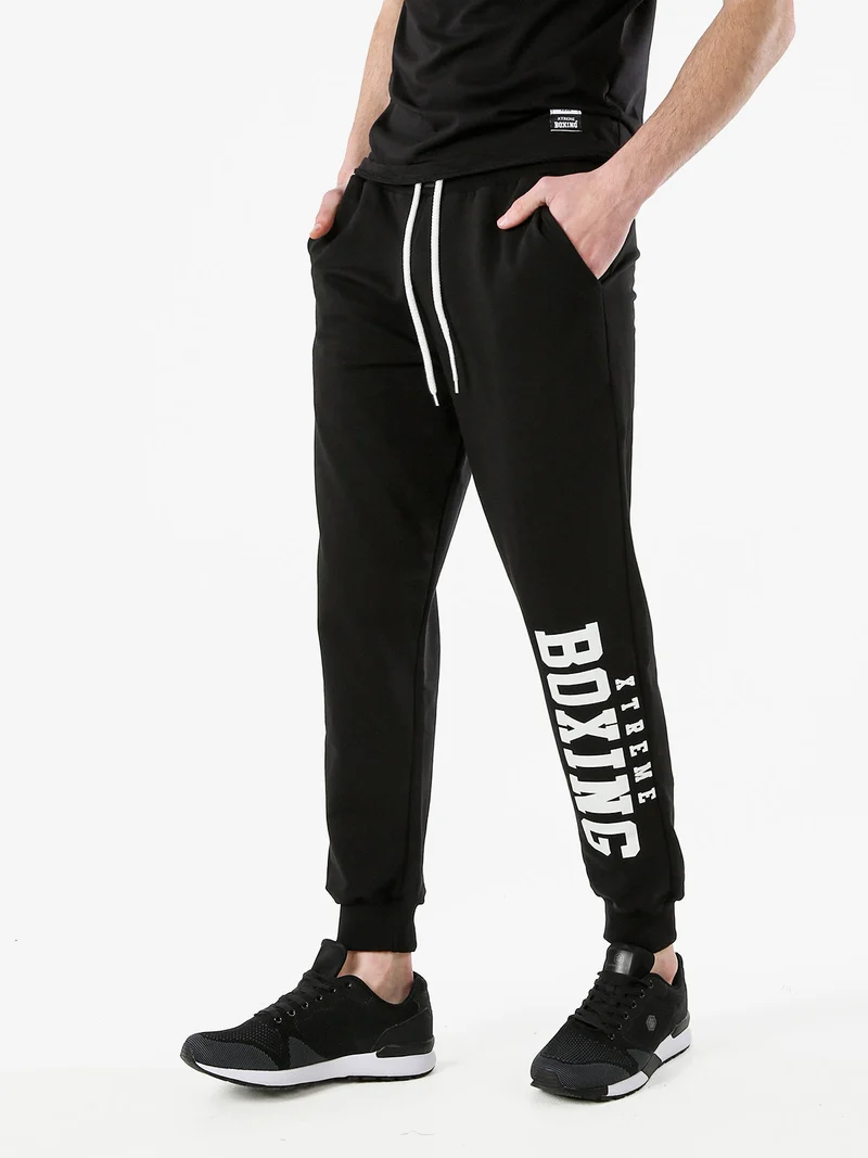 Pantaloni tuta da uomo in cotone con coulisse e logo - nero
