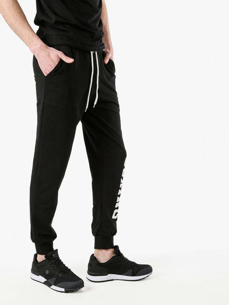 Pantaloni tuta da uomo in cotone con coulisse e logo - nero