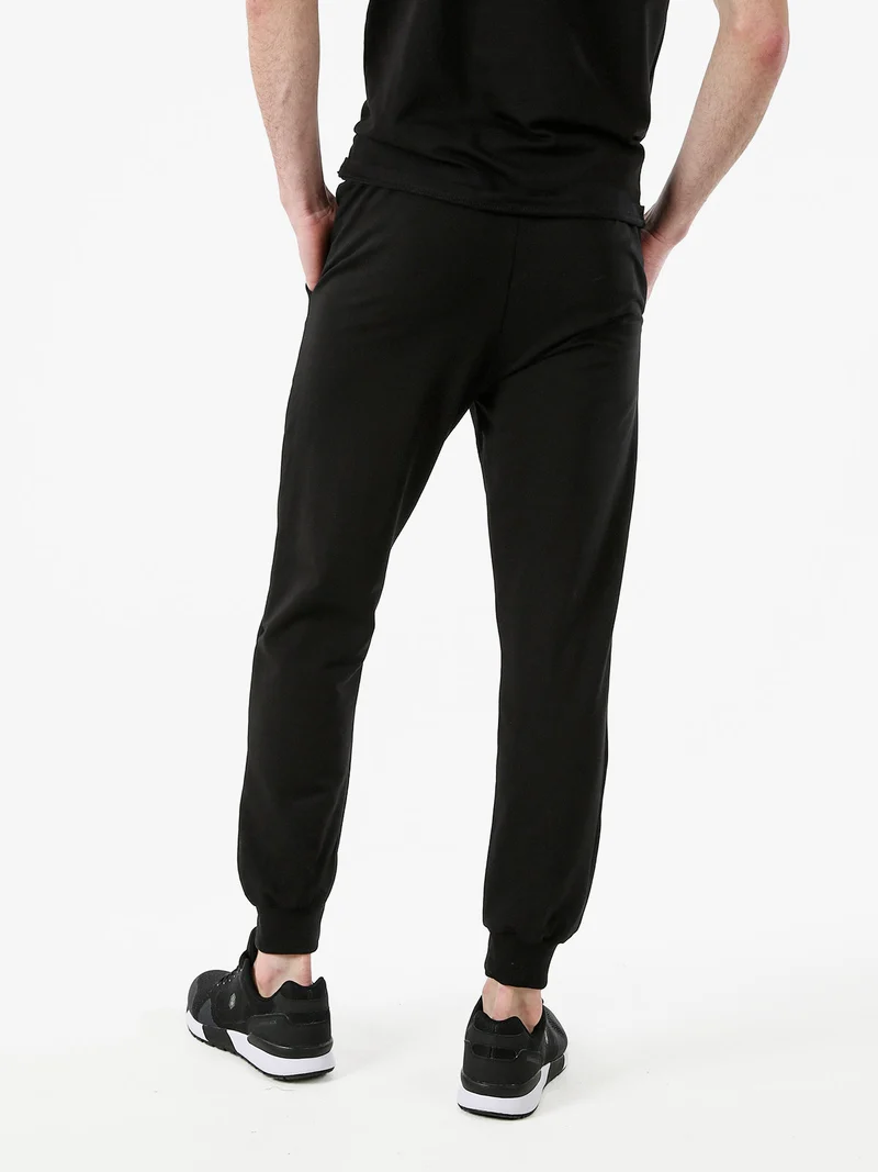 Pantaloni tuta da uomo in cotone con coulisse e logo - nero