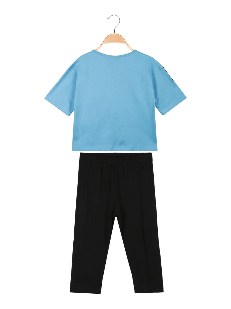 Completo corto da bambina con leggings 3/4 - azzurro