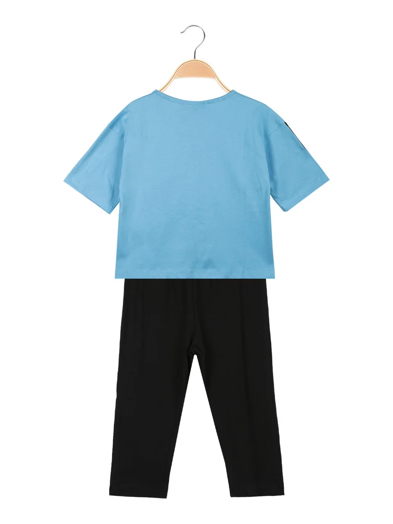 Completo corto da bambina con leggings 3/4 - azzurro