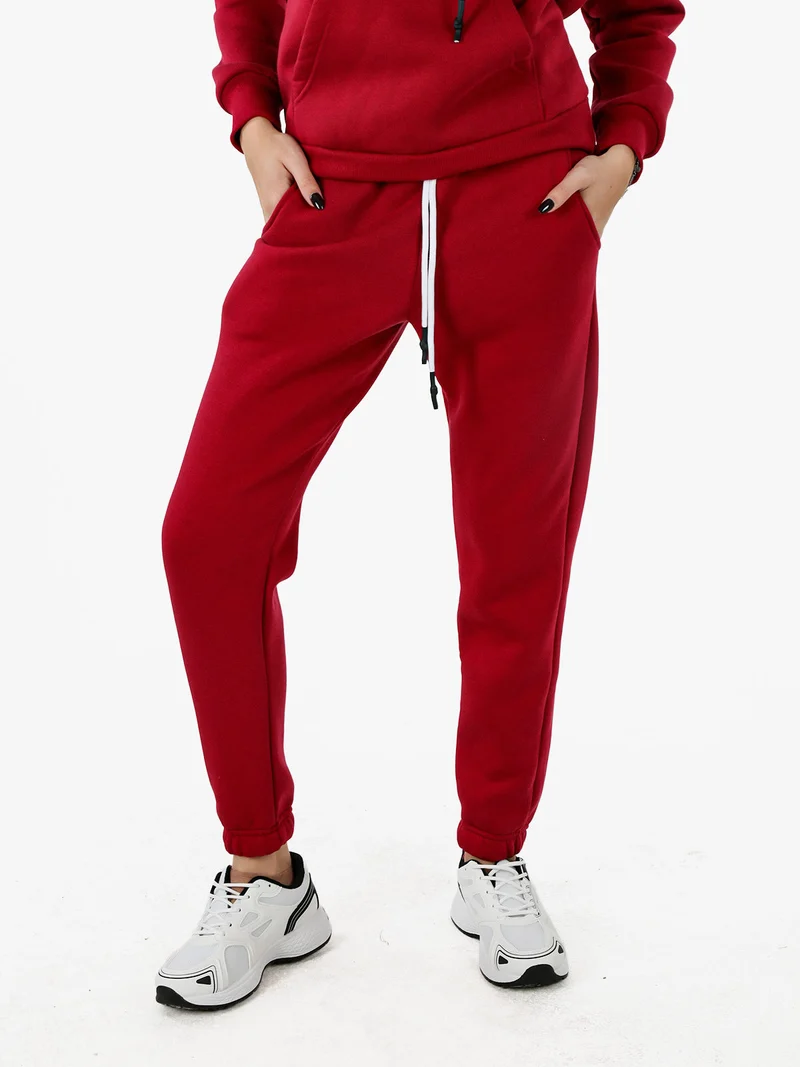 Pantaloni tuta da donna felpati con coulisse - bordeaux