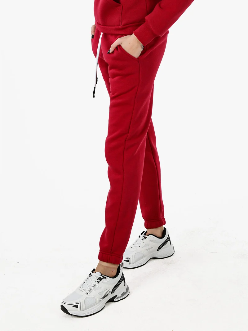 Pantaloni tuta da donna felpati con coulisse - bordeaux