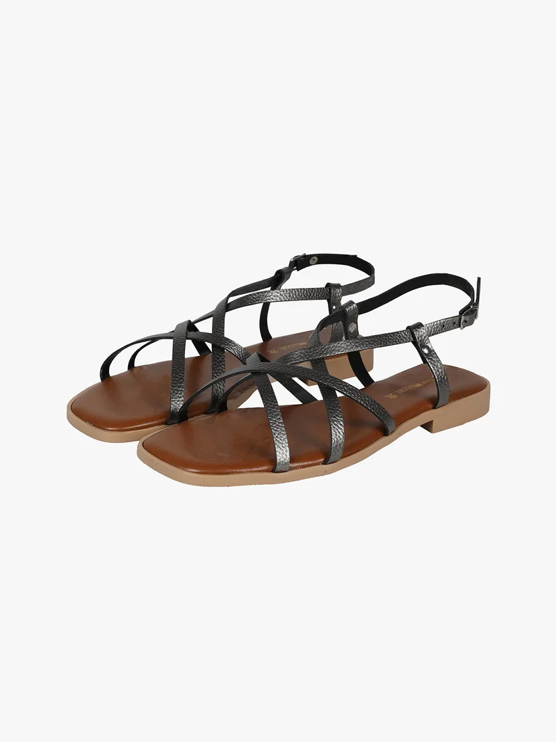 Sandali bassi in pelle da donna con fascette incrociate - grigio