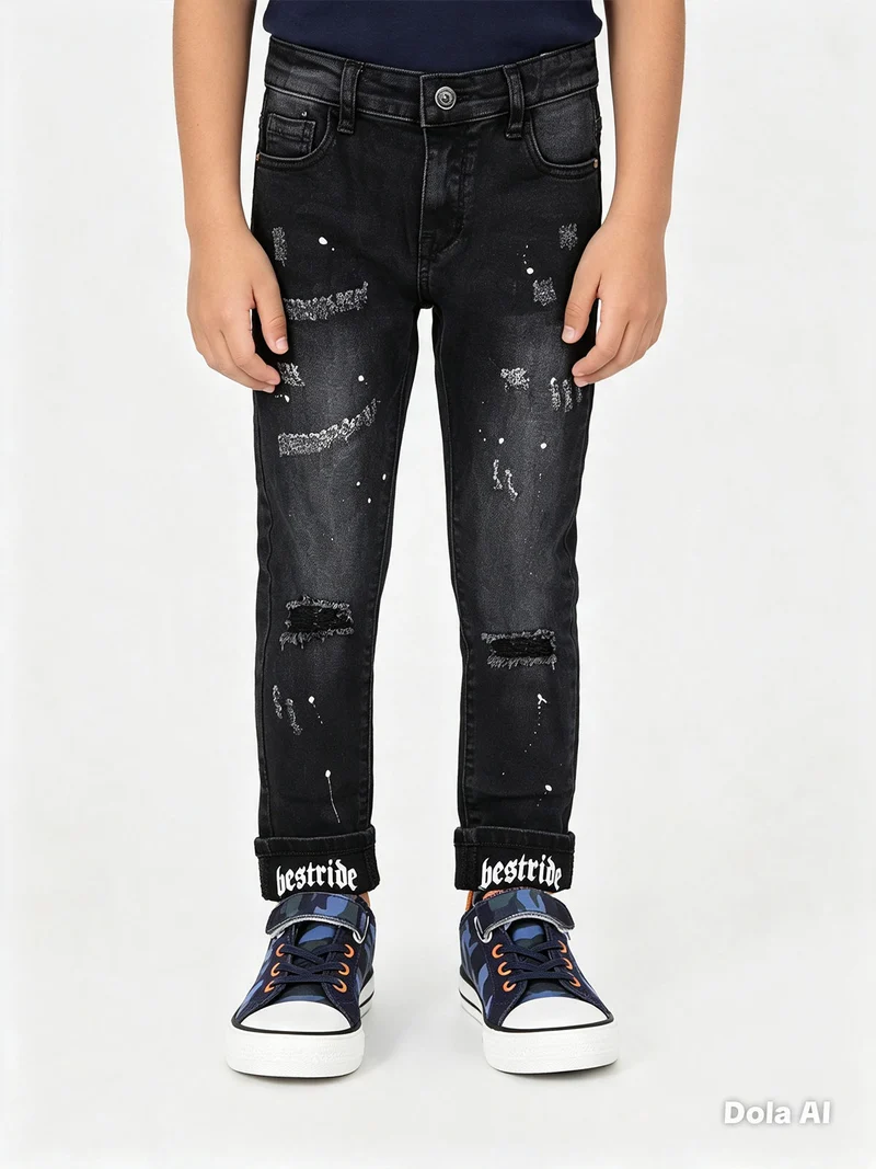 Jeans da bambino con strappi - nero