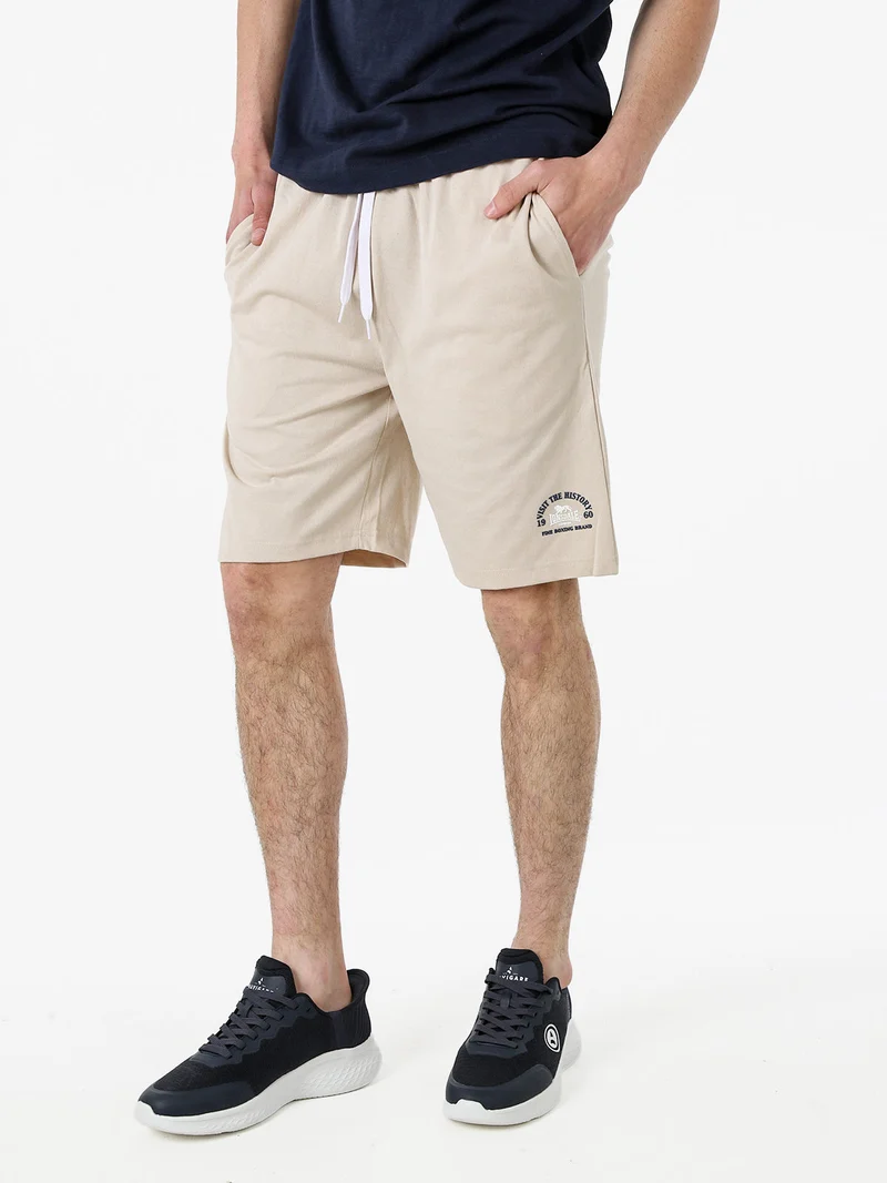 Bermuda sportivi da uomo con logo e coulisse - naturale