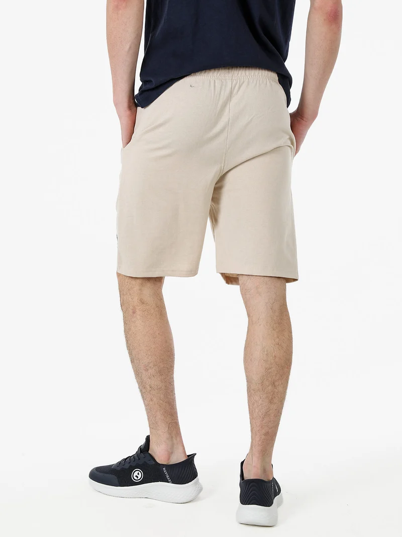 Bermuda sportivi da uomo con logo e coulisse - naturale