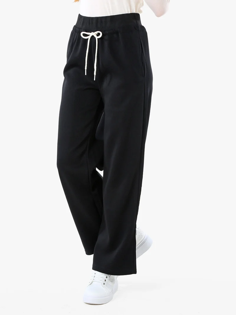 Pantaloni da donna sportivi a gamba larga - nero