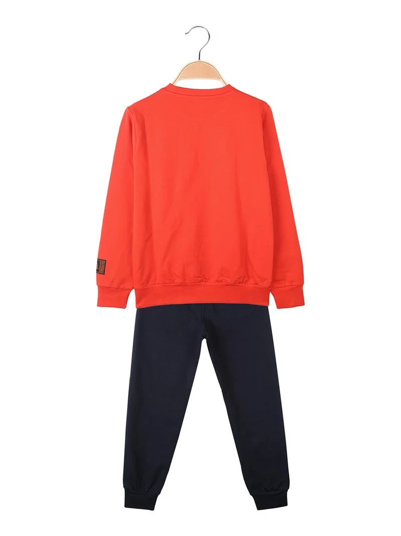 Completo tuta da bambino in cotone con felpa girocollo e pantaloni con polsini - rosso