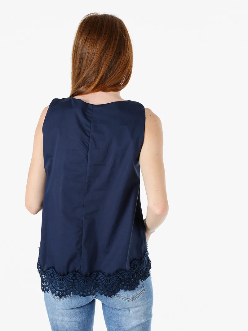 Top donna in cotone con pizzo sul finale - blu scuro