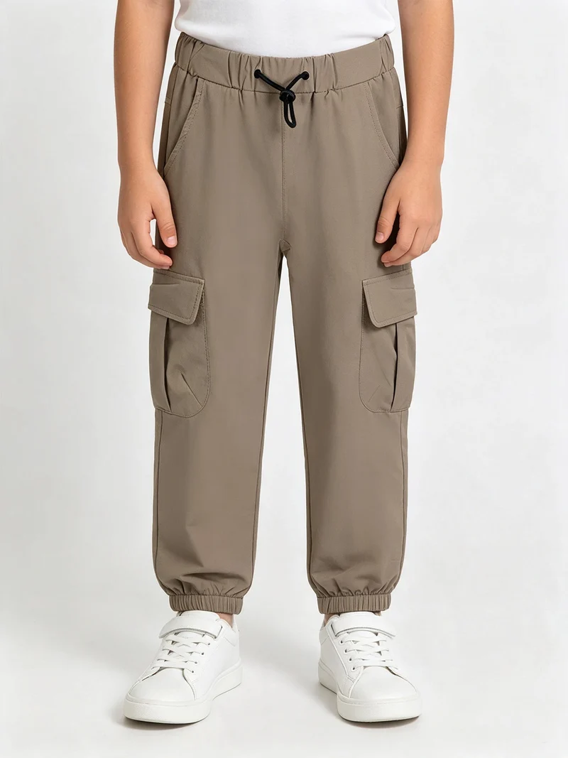 Pantaloni cargo da bambino con tasconi e polsini - khaki