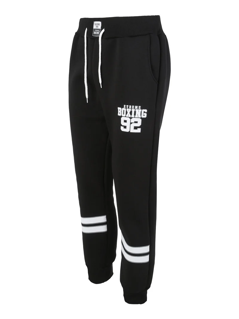 Pantaloni tuta da uomo felpati con polsini - nero