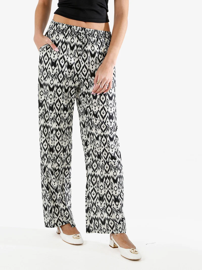 Pantaloni donna in cotone a gamba larga con coulisse e stampe - multicolore