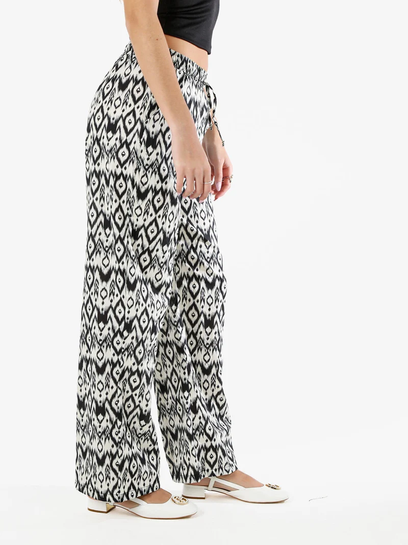 Pantaloni donna in cotone a gamba larga con coulisse e stampe - multicolore